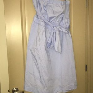 Strapless light blue dress.